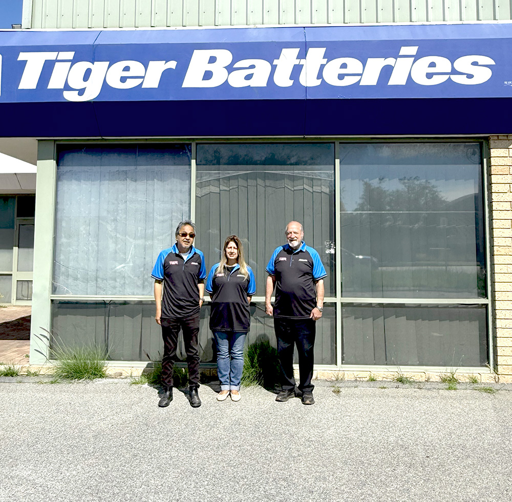 The Tiger Batteries team outside the shop front in Welshpool
